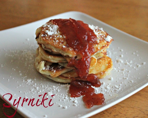 Homemade Syrniki - a delicious Ukranian Pancake topped with jam