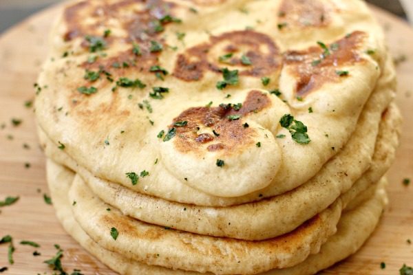 An easy recipe for homemade Naan Bread so you can get to making your own Indian food at home. Also makes for a great side or even a pita!